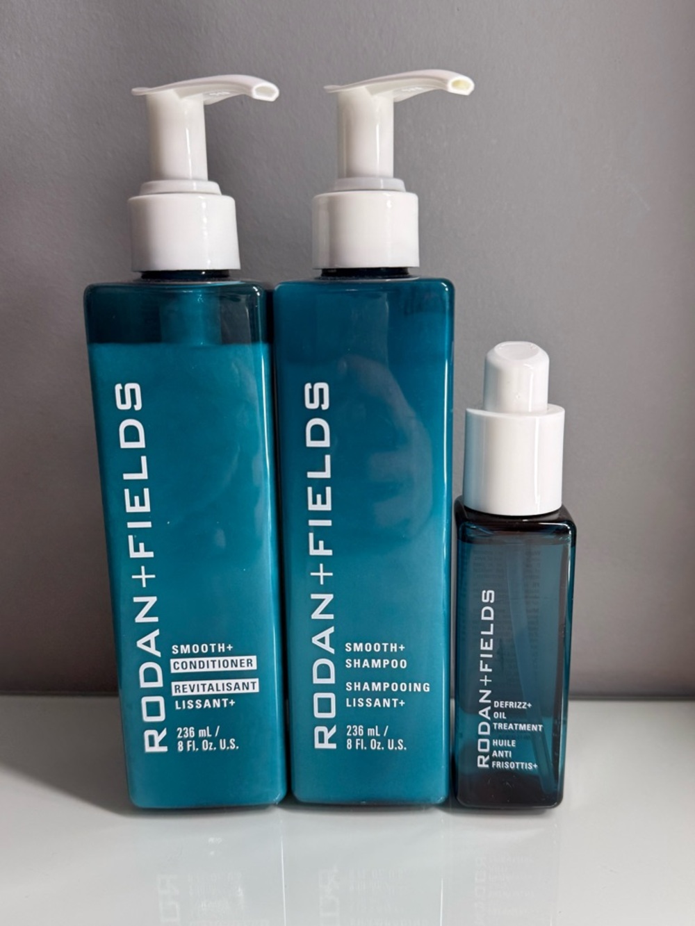 LIKE NEW Rodan + Fields Smooth+ Shampoo, Conditioner, and Defrizz+ oil treatment